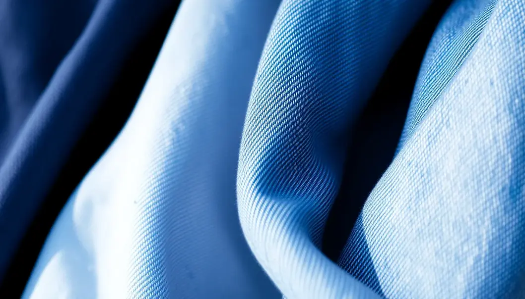 Detailed view of high-quality denim fabrics emphasizing weave and stitching.